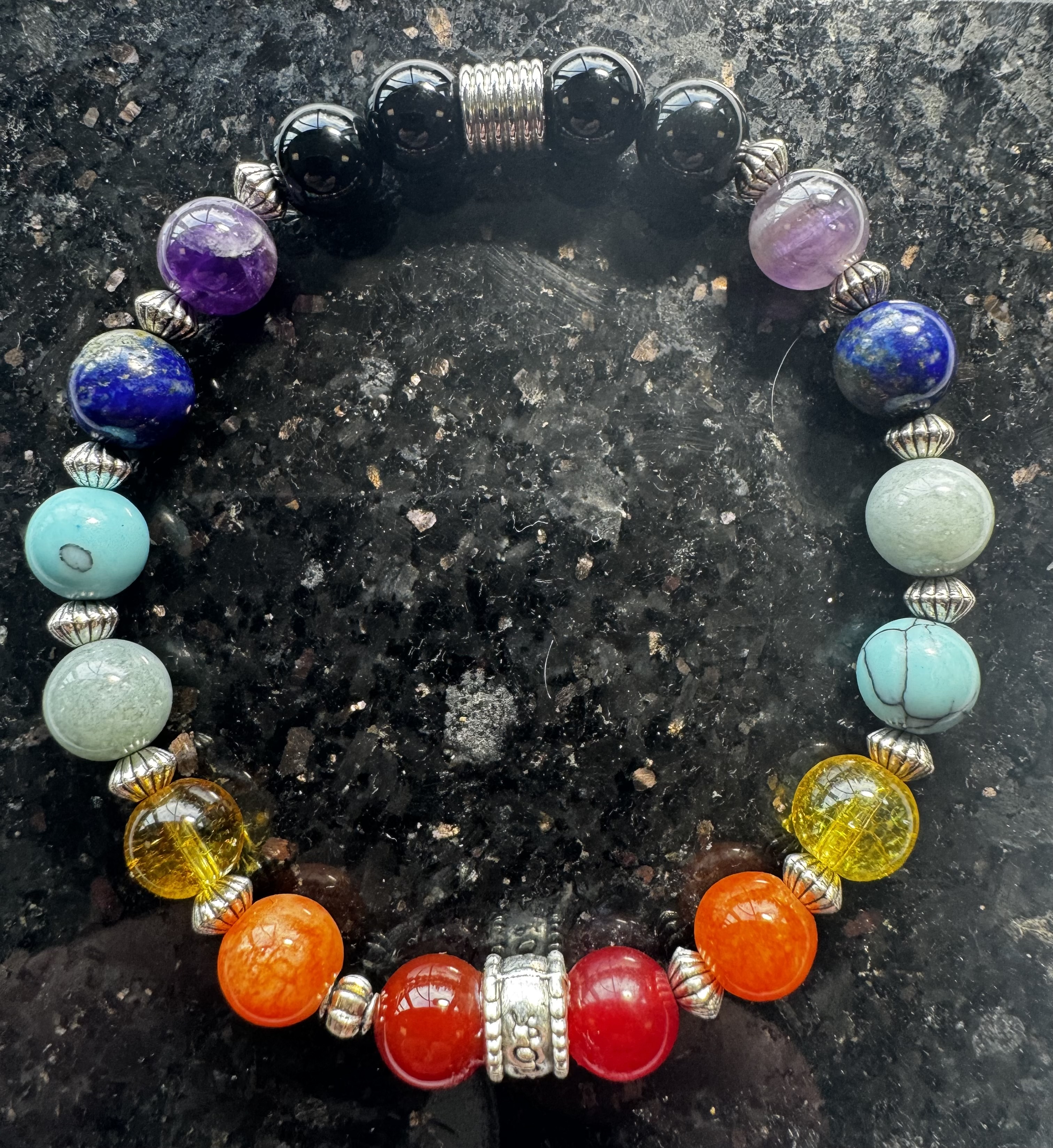 Chakra bracelet with silver barrel