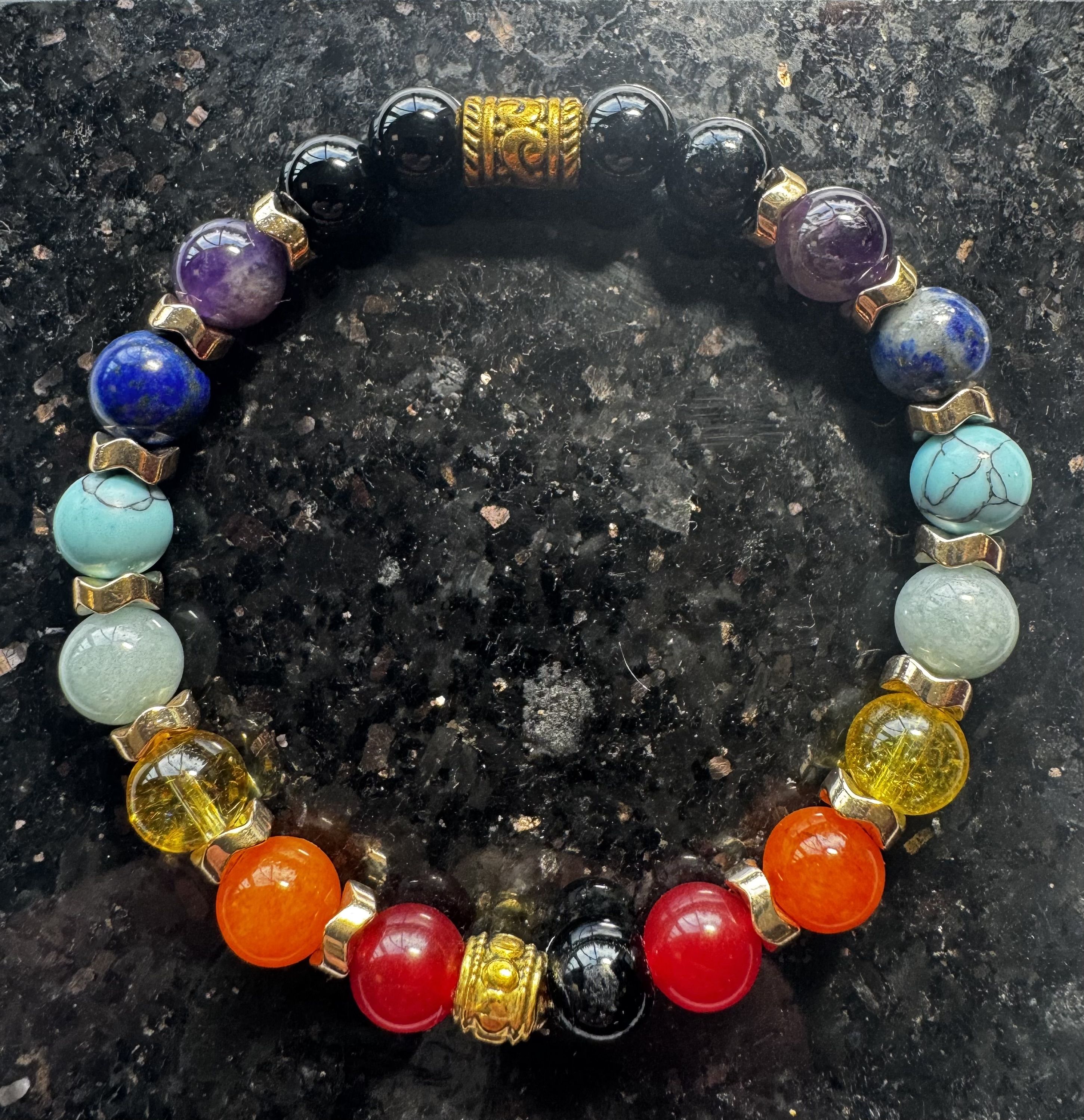 Chakra bracelet with gold accents