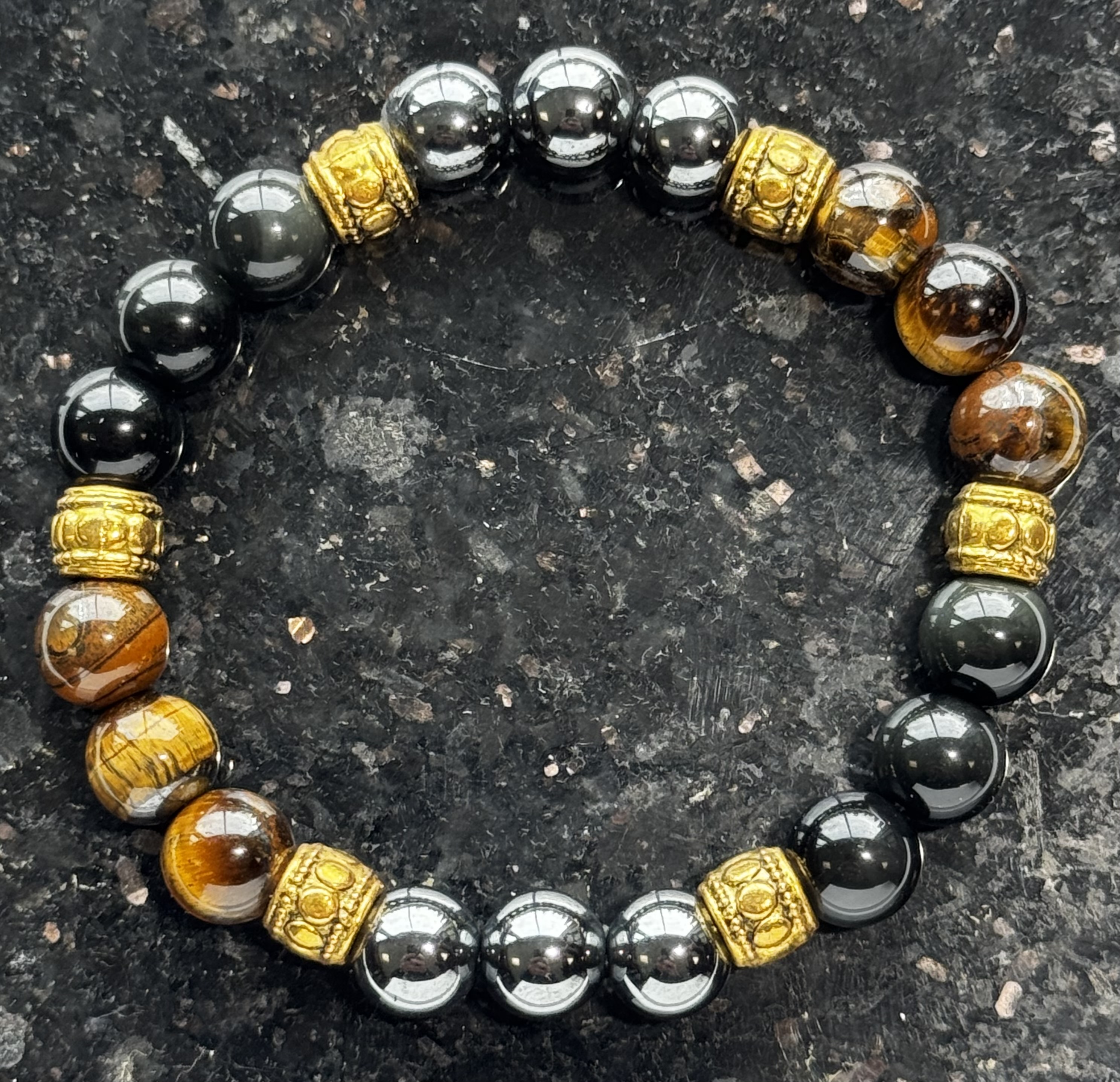 Tiger eye and hematite with gold barrels